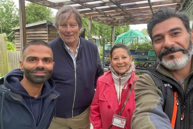 Cllr Guy Lambert (second left) on visit to local allotments 