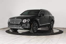 A picture containing car, roof  Description autoBentley Bentayga