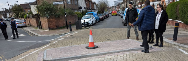 Cone on road barrier