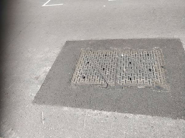 A picture containing road, outdoor, building, street  Description automatically generated