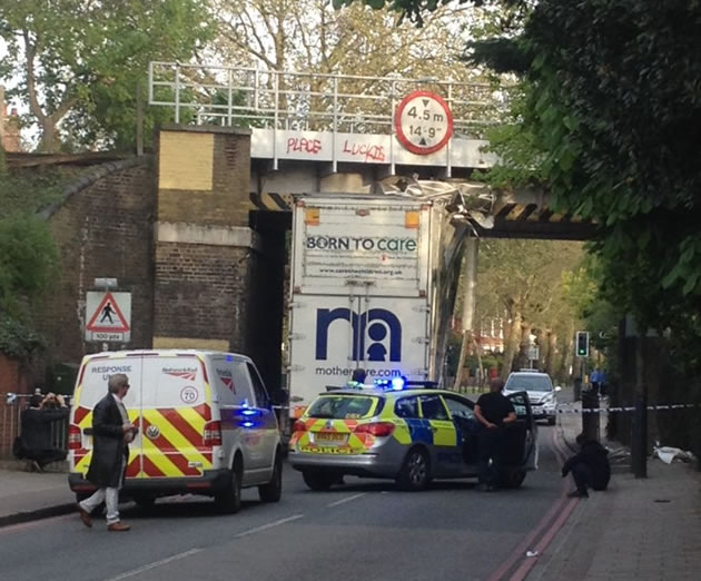 Lorry hits rail bridge