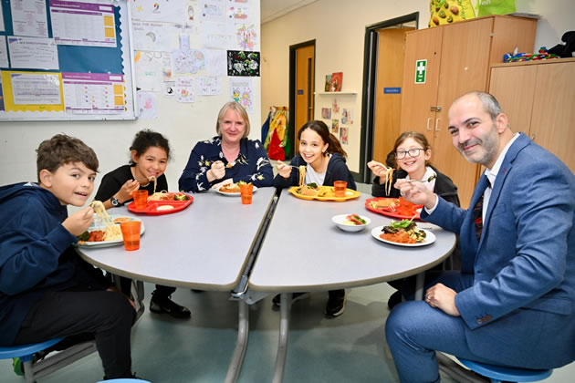 The Deputy Mayor eats lunch with Grange school children and local Assembly Member Bassam Mahfouz