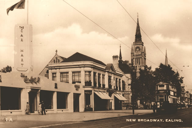 A Feltham-type tram progressing along New Broadway past the Car Mart Ltd. building in 1935