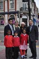 Cabinet member for transport and environment, Cllr Bassam Mahfouz with children, parents and the deputy headteacher of St John's Primary School