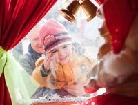 Child visits Santa in Lyric Square