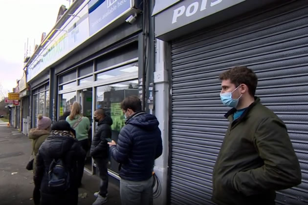 People queueing this week for booster jabs outside pharmacy