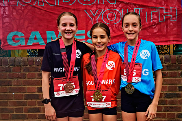 Sophia Davis (right) with her medal