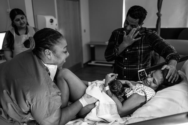Midwife Caitlin Came continues to check on a baby’s wellbeing following a successful ECV.